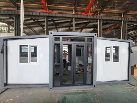 जस्ती इस्पात फ्रेमवर्क 40ft विस्तार योग्य कंटेनर घर के साथ तैयार-टू-प्लंबिंग और टी 65 मिमी ईपीएस रंग स्टील प्लेट वॉलबोर्ड